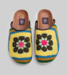 This signature pair of clogs is made by hand at our atelier from crocheted yarn that was pieced together by our co-op of women on the outskirts of Marrakech. They feature a cork bed molded to the shape of your foot, a suede upper lining, a leather trim and a durable rubber sole. Our clog design is inspired by the late-13th and early-14th century original shoes worn by peasants and lower classes in Europe. Read the history of the clog on our journal. One-of-a-kind100% wool hand-crochet outerCork foot bed molded to the shape of your footSuede upper liningLeather trimDurable rubber soleHandmade in our Marrakech atelier View all Crochet Clogs Women’s Sizing US EU UK 6 / 6 1/2 36 4 7 / 7 1/2 37 5 8 / 8 1/2 38 6 9 / 9 1/2 39 7 10 / 10 1/2 40 8 Men’s Sizing 8 / 8 1/2 41 7 / 7 1/2 9 / 9 1/2 42 8 / Casual Handmade Closed Toe Clogs, Crochet Clogs, Cork Bed, Clogs Women, Foot Bed, 14th Century, Womens Clogs, Shape Of You, 7 And 7