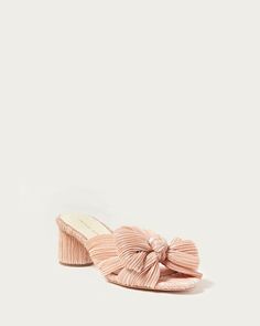 Mid-heeled mule in a shimmery peach fabric topped with our signature pleated bow. Padded footbed with gold stamped logo. Open toe, slips on. 2 inch heel. Preppy Boots, Bow Mules, Peach Fabric, Preppy Women, Raw Fabric, Heeled Mule, Beautiful Gift Wrapping, Pattern Play, Loeffler Randall