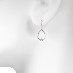 These gorgeous silver tone teardrop cubic zirconia nickel free drop earrings are the perfect way to finish any outfit. These gorgeous silver tone teardrop cubic zirconia nickel free drop earrings are the perfect way to finish any outfit. Length: 1.639 in. Backings: fishhook Metal: brass Plating: silver tone Finish: polished Stone: cubic zirconia Additional details: nickel free Not appropriate for children 14 years old and younger. Size: One Size. Gender: female. Age Group: adult. Diamond White Cubic Zirconia Teardrop Earrings, Elegant Nickel-free Teardrop Earrings, Hypoallergenic Diamond Teardrop Earrings, White Gold Teardrop Earrings, Silver Hypoallergenic Teardrop Earrings For Anniversary, Elegant Hypoallergenic Teardrop Diamond Earrings, Diamond White Teardrop Earrings, Hypoallergenic Silver Teardrop Earrings, Silver Hypoallergenic Teardrop Earrings