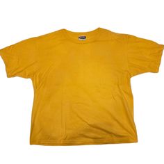 "90s Simply Basic Plain Yellow t-shirt / Men's X-Large / Blank shirt Tag size: no tag Fits like: Men's X-Large Measurements: -chest (pit to pit): 23\" -length (top of shoulder to bottom hem): 26\" -sleeve (shoulder seam to end of cuff): 8\" -shoulders: 21\" across Condition: Great condition, No holes, no stains -SOLD AS IS- Please check measurements for sizing and condition for flaws and distressing before purchasing, this item is sold AS IS. -NO RETURN OR EXCHANGES- Items are vintage and will show normal vintage wear. Significant flaws or distressing shown in pictures. If you need further measurements please send a message, we are happy to provide more info"