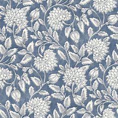 a blue and white wallpaper with flowers on it