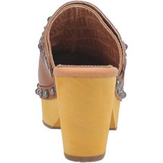 Slip into style and comfort with our Dingo1969 Deadwood clogs. These close-toed, leather slip-ons with metal accents and fashionable riveting are your new go-to for elevating any ensemble with a touch of well-to-do elegance. Brown Closed Toe Clogs With Studded Outsoles, Brown Closed Toe Mules With Studded Rubber Outsoles, Brown Slip-on Mules With Studded Rubber Outsoles, Brown Slip-on Mules With Studded Outsoles, Casual Wood Mules With Round Toe, Casual Brown Clogs With Studded Rubber Outsoles, Wooden Slip-on Mules, Western Leather Clogs With Round Toe, Casual Brown Wooden Clogs