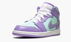 The Jordan 1 Mid PS “Purple Pulse/Glacier Blue” gives an Easter-inspired look to the preschool sizing version of Michael Jordan’s first signature shoe.  Standing out from the crowd, the “Purple Pulse/Glacier Blue” features a two-tone color block of pastel purple and turquoise green.  The forefoot, eyelets, collar, heel, and Swoosh are displayed in Purple Pulse tumbled leather.  Glacier Blue leather on the perforated toe, mid-panel, collar, and “Wings” detailing contrasts the look.  A pink Jumpma Purple Basketball Shoes With Translucent Outsole, Purple High-top Basketball Shoes With Translucent Outsole, Casual Purple Jordan Shoes With Round Toe, Casual Purple Jordan Shoes, Air Jordan 1 Mid Purple, Jordan 1 Mid Purple, Dunk Low Nike, Nike Air Jordan 1 Mid, Marina Blue