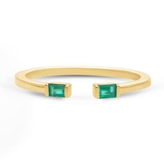 Emerald Baguette Open Ring Elevate your everyday style with the 'Vida Ring', a timeless classic that exudes understated sophistication. Crafted for comfort and versatility, this open ring boasts the highest quality 3x2mm baguette shaped emeralds that add a touch of glamour with every presentation. SKU BS32187R EMERALD SIZE 3x2mm COLORSTONE SHAPE Baguette Ethically sourced emeralds directly from our renowned Belmont mine in Brazil. Modern Yellow Gold Baguette-cut Emerald Ring, Classic Baguette Rings For Everyday, Modern Yellow Gold Baguette Ring, Modern Baguette Yellow Gold Rings, Modern Yellow Gold Emerald Open Ring, Modern Yellow Gold Open Emerald Ring, Modern 14k Gold Open Emerald Ring, Timeless 14k Gold Baguette Ring, Modern 14k Gold Emerald Ring For Everyday