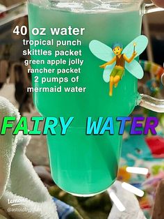 there is a green liquid in the cup with a yellow fairy on it and text that reads, 40oz water tropical punch skittles packet green apple cremer