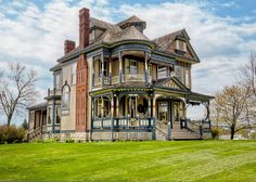 an old victorian style house in the country