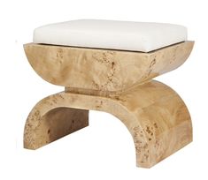 a wooden bench with a white cushion on it's top and bottom part in the shape of a footstool