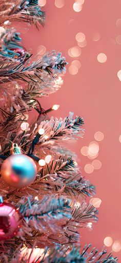 a christmas tree with ornaments and lights on it