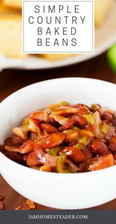 a white bowl filled with beans and bacon