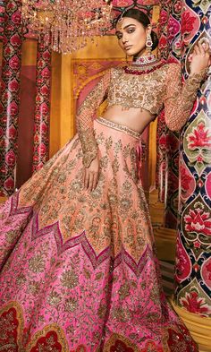 Pink and Peach Wedding Lehenga in Raw Silk with zardozi embroidery This lehenga set is in Raw Silk with zardozi embroidery on skirt and blouse. Dupatta edges are also embroidered in hand embroidery. You have the option to change the Color and blouse style according to your requirements. Please contact our Sales Team through WhatsApp +61470219564 to discuss your requirements. Brand: Panache Haute Couture Availability: Online and In-store Production Time & Delivery: 8-12 Weeks Fabric- Lehenga - Ra Peach Color Lehenga, Pink And Peach Wedding, Mehndi Bridal, Peach Lehenga, Mehndi Bride, Pakistani Mehndi, Bridal Lehenga Collection, Designer Bridal Lehenga, Lehenga Choli Online