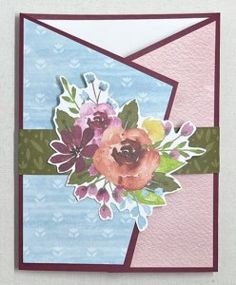 a close up of a greeting card with flowers on the front and bottom corner,