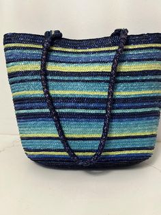 Colorful blue yellow stripes. 14.5" long, 11" height, 13" handles drop, 9" dept. snap closure 1 pocket zipped. New without tag. Wheat Straw, Yellow Stripes, Faded Glory, Beach Bag, Blue Yellow, Snap Closure, Purses And Handbags, Wheat, Shoulder Bags