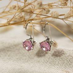 Unique Pink Cubic zirconia Drop Earrings, made of 925 Sterling Silver, Round Shaped, Fashion Jewelry for Women, Handmade By AditaGold.  These beautiful handmade pink cubic zirconia dangle earrings are made of silver and are carefully handcrafted at my workshop in Israel. Cubic zirconia is 's birthstone, and these gemstone silver drop earrings will be perfect for any occasion. They are classic and elegant and will add a beautiful sparkle to a day or evening look.  Item details   * A pair of Cubic Dangle Earrings Silver, Handmade Fashion Jewelry, Cubic Zirconia Earrings, Zirconia Earrings, Evening Look, Silver Drop Earrings, Silver Earrings Dangle, Handmade Fashion, Earrings Dangle