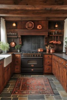 a kitchen with wooden cabinets and black stove top oven next to an area rug on the floor