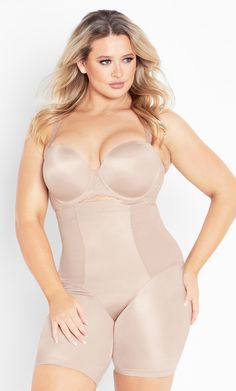 The Smooth & Chic Thigh Shaper is a supportive shapewear essential. A wide and high non-roll elastic support to the waist with a cotton gusset and stretch fabrication offer this shapewear style a sleek, figure-smoothing finish. Key Features Include: - Wide high non-roll elastic support - Gel tape for securing banding - Power net lining for a smooth, sleek silhouette - 100% Cotton gusset - Thigh support Suitable for wearing under dresses, pants or skirts, this thigh shaper is an adaptable essenti Thigh Shaper, Girdles Shapewear, Sheath Gown, Denim Short Dresses, Under Dress, Women's Shapewear, Dresses Pants, Plus Size Lingerie, Body Shapers