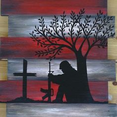 a painting of a man kneeling in front of a tree with a cross on it