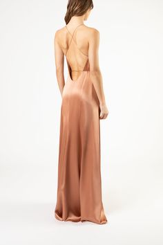 Full length wrap gown in pure silk satin. Features a low neckline, open back, and thin straps that tie at waist. Fully lined in silk. Imported.   Composition: 100% silk Nude Silk Dress, Low Neckline, Silk Gown, Wedding Bells, Silk Satin, Pure Silk, Silk Dress, Open Back, Formal Dresses Long