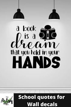 a wall decal that reads, a book is a dream that you hold in your hands