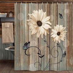 the shower curtain is decorated with white flowers and butterflies on wooden planks, along with a blue butterfly