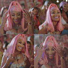 a woman with pink hair is smiling and waving