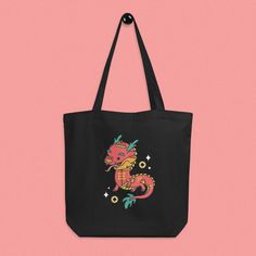 Year of the Dragon Tote Bag - Ni De Mama Chinese - Inspired Clothing | Black Black Bags For Festivals And Gifts, Mama Clothing, Mama Cloth, Organic Compost, Zodiac Collection, Zodiac Designs, Eco Tote Bag, New Year Designs, Dragon Balls