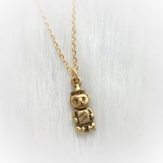 Super detailed 3D 22k gold plated pewter Honey Bear bottle charm, on your choice of dainty or regular 18 inch gold plated brass chain with lobster clasp closure. + GIFT BOX: https://www.etsy.com/listing/239177357 + POLISHING CLOTH: https://www.etsy.com/listing/158735718 ... COMBINED SHIPPING Dainty Adjustable Brass Charm Necklace, Handmade Brass Charm Necklaces For Gifts, Nickel-free Gold Brass Charm Necklaces, Small Gold Jewelry Gift, Dainty Brass Charm Necklace With Lobster Clasp, Small Gold Jewelry For Gifts, Dainty Nickel-free Brass Necklace, Dainty Gold Brass Charm Necklace, Dangle Brass Charm Necklace With Lobster Clasp