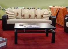 a living room filled with lots of different colored furniture and decorating items on display