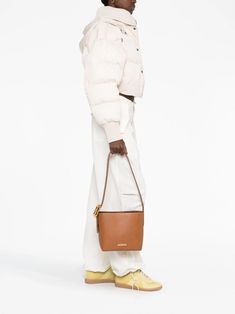 Jacquemus Сумка На Плечо Le Petit Patou - Farfetch Chic Brown Shoulder Bag With Gold-tone Logo Plaque, Brown Calf Leather Shoulder Bag With Brass Hardware, Classic Calf Leather Shoulder Bag With Gold-tone Logo Plaque, Formal Brown Shoulder Bag With Gold-tone Logo Plaque, Modern Crossbody Shoulder Bag With Gold-tone Logo, Brown Bag With Gold-tone Logo Plaque For Everyday, Brown Bag With Gold-tone Logo For Everyday Use, Luxury Brown Bag With Gold-tone Logo Plaque, Modern Shoulder Bag With Gold-tone Logo For Travel