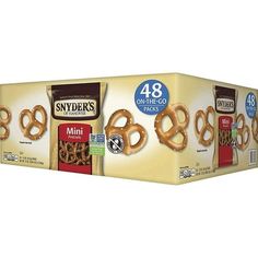 three boxes of mini pretzels with the same product in each box and one on the other side