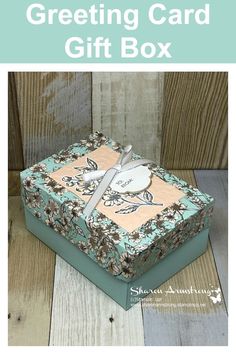 a gift box with the words greeting card gift box written on it and an image of a