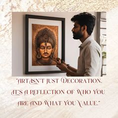 a man looking at a painting on the wall with a quote from srishri