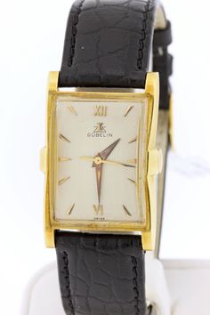 This Gubelin wrist watch has a Swiss movement housed in an 18K Yellow gold case.The piece is marked 127478 and does not come with papers or branded box.  The case measures  26.52mm wide 38.68mm long and sits 9.97mm tall. The gap between the lugs is 19mm wide. What a wonderful addition to any collection!  B4006cIPPPM   --Please reference our policy for more details-- ALL timepieces are fully serviced and checked for keeping correct time prior to leaving. For International orders, please provide a Gold Filigree Bracelet, Tank Watch, Star Watch, Filigree Bracelet, Retro Watches, Old Watches, Gold Case, Beautiful Watches, Wristwatch Men