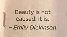 a close up of a piece of paper with a quote on it that says beauty is not cause, it is