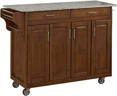 a kitchen island with two drawers on wheels