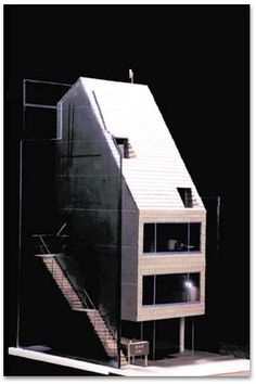 an architectural model of a house with stairs leading up to it