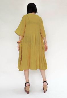 "🚚..ALL ORDERS ARE SHIPPED VIA DHL EXPRESS MAIL An easy flatter floral appliqué tunic dress with round neck, short sleeves, side seam pockets. The front piece is sewn to the neck line and shoulder then let it hanging down to the side seam, look like a wing. This will create aflutter while you are moving. Terrific with long skirts, pants, leggings or alone as a flirty summer dress. NOTE: You may want to wear inner-wear when wearing this soft cotton tunic dress. As it can see through when you are Oversized Knee-length Dresses For Spring, Spring Bohemian Solid Color Dress, Solid Color Spring Bohemian Dress, Plain Spring Vacation Dresses, Bohemian Solid Color Spring Dresses, Solid Color Bohemian Spring Dress, Plain Dresses For Vacation In Spring, Plain Summer Beach Dresses, Oversized Knee-length Dress For Daywear