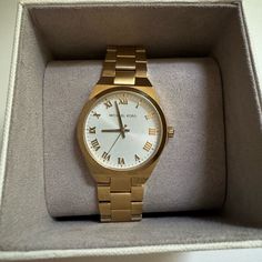 This Is The Lennox Gold Tone Watch From Michael Kors And Is A Women’s Watch. Case Size Is 37mm. I Just Received This Watch As A Graduation Gift But The Case Is Too Big For Me. Has Only Been Tried On. Unfortunately I Can’t Return It Because Of The Engraving On The Back (Arb). The Red Line On The Engraving Side Is The Protective Sticker I Still Have Not Taken Off. Just Goes To Show How Brand New It Is. Originally 200$ Timeless Michael Kors Watch As Gift, Michael Kors Timeless Watch As Gift, Classic Michael Kors Watch As Gift, Classic Michael Kors Watch For Gift, Michael Kors Gold Watch With Subdials, Michael Kors Gold Watches For Formal Occasions, Michael Kors Formal Round Watches, Michael Kors Classic Formal Watch, Michael Kors Formal Watches