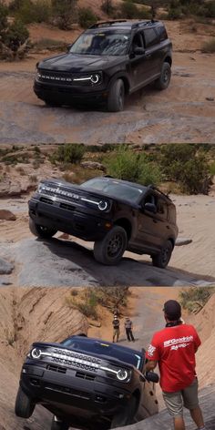 two black trucks driving down a dirt road next to a man in red shirt and tan shorts