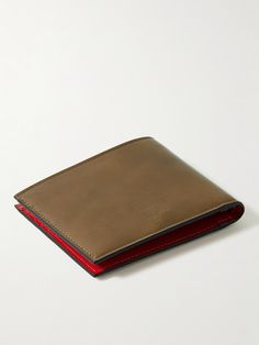 When the time comes to upgrade your wallet, it's important to consider practicality and craftsmanship. Christian Louboutin's billfold style is made from supple leather and has plenty of compartments to keep receipts and cards organised. It's topped with a logo plaque and has signature red lining. Designer Leather Wallet With Smooth Grain, Designer Brown Leather Wallet, Designer Bifold Wallet With Leather Lining, Designer Trifold Leather Wallet With Coin Pocket, Designer Leather Trifold Wallet, Luxury Bifold Wallet With Leather Lining, Designer Leather Bifold Wallet, Luxury Brown Leather Wallet, Luxury Brown Wallet With Logo Plaque