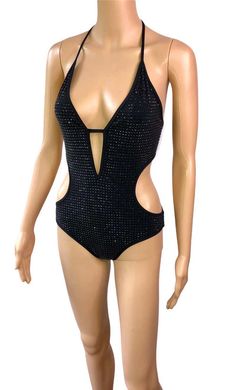 For Sale on 1stDibs - Gucci Crystal Embellished Cutout Black One Piece Bodysuit Swimsuit Swimwear Size M Excellent Condition! Gucci Swimwear For Summer, Gucci Fitted Summer Swimwear, Glamorous Backless Party Swimwear, Black Rhinestone Bodysuit For Evening, Gucci Beachwear Swimwear For Summer, Black Embellished Evening Bodysuit, Glamorous Embellished Black Bodysuit, Glamorous Fitted Sleeveless Swimwear, Sleeveless Beachwear Bodysuit For Party