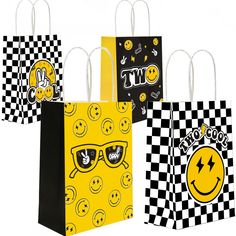 three shopping bags with smiley faces and sunglasses on them