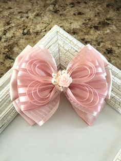 "This beautiful handmade hair bow would be perfect for everyday wear or special occasions. The 5\" bow is mounted on a 2 3/4\"  french barrette clip and measures approximately 5\" X 4\". The 3\" bow is mounted on a 2\"  French barrette clip and measures about 3\" X 3\". The bow ribbons have treated ends to prevent fraying.  I could also mount the bows on a 2 1/4\" single-prong alligator clip upon request. This listing is for one hair clip in PINK BLUSH color in your size and clip choice: 3 inche Bow Wedding Hair, Wedding Hair Bow, Hair Bow Wedding, Flower Girl Hair Bows, Communion Hair, Communion Hairstyles, Pink Hair Bow, Flower Girl Hair, Homemade Bows