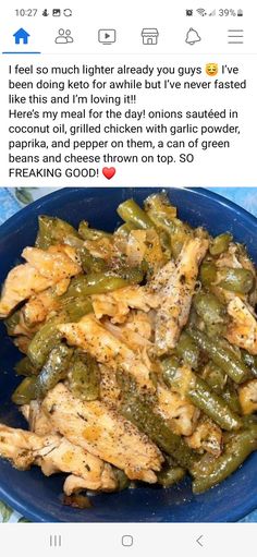 a blue plate topped with chicken and green beans