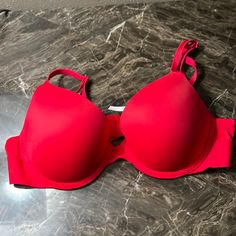 Red Strapped New Without Tags Lined 34 B Red Push-up Bra With Padded Cups, Red Stretch Bra With Padded Cups, Red Padded Push-up Bra, Red Stretch Push-up Bra, Red Seamless Push-up Bra, Seamless Red Push-up Bra, Red Fitted Seamless Bra, Fitted Red Padded Bra, Fitted Seamless Red Bra