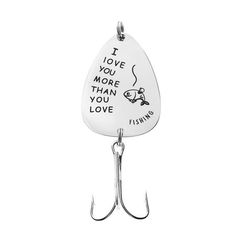 a fishing hook with the words i love you more than you love it on it