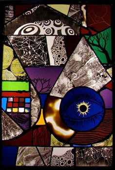 a colorful stained glass window with an abstract design