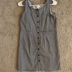 Selling The Plaid Sleeveless Button Up Dress From Tilly’s. It’s Cute And Never Worn!! You Can Wear It In Spring/ Summer In It’s Own Or Layer It With Black Or White Turtle Neck Or Long Sleeve Top In Fall/ Winter. Super Cute!! Overall Length (Shoulder To The Hem)- 30.5 Inches Chic Cotton Sleeveless Dress With Buttons, Casual Black Sleeveless Dress With Buttons, Sleeveless Cotton Dress With Button Back, Casual Cotton Sleeveless Dress With Buttons, Sleeveless Button-back Dresses For Day Out, Sleeveless Dress With Button Back For Day Out, Sleeveless Button Back Dress For Day Out, Fitted Casual Sleeveless Dress With Buttons, Fitted Sleeveless Dress With Buttons For Casual Wear