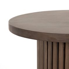 a close up of a wooden table on a white background with no people around it