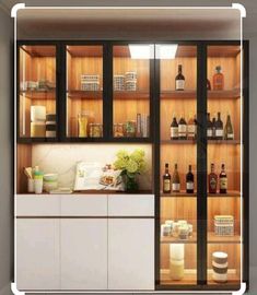 a kitchen with lots of bottles on the shelves