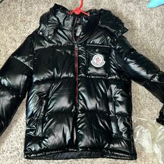 Stylish Moncler Coat In Size Medium, Barely Used And In Excellent Condition. This Classic Black Coat Is Both Timeless And Functional, Perfect For Keeping Warm In Style During The Colder Months. Ideal For Anyone Looking To Add A Touch Of Luxury To Their Wardrobe While Staying Cozy. Don't Miss Out On This Opportunity To Own A Premium Piece At A Fraction Of The Retail Price!" Moncler Coat, Moncler Puffer, Moncler Jacket, Puffer Coat, Black Coat, Keep Warm, Mens Coats, Classic Black, Mens Jackets